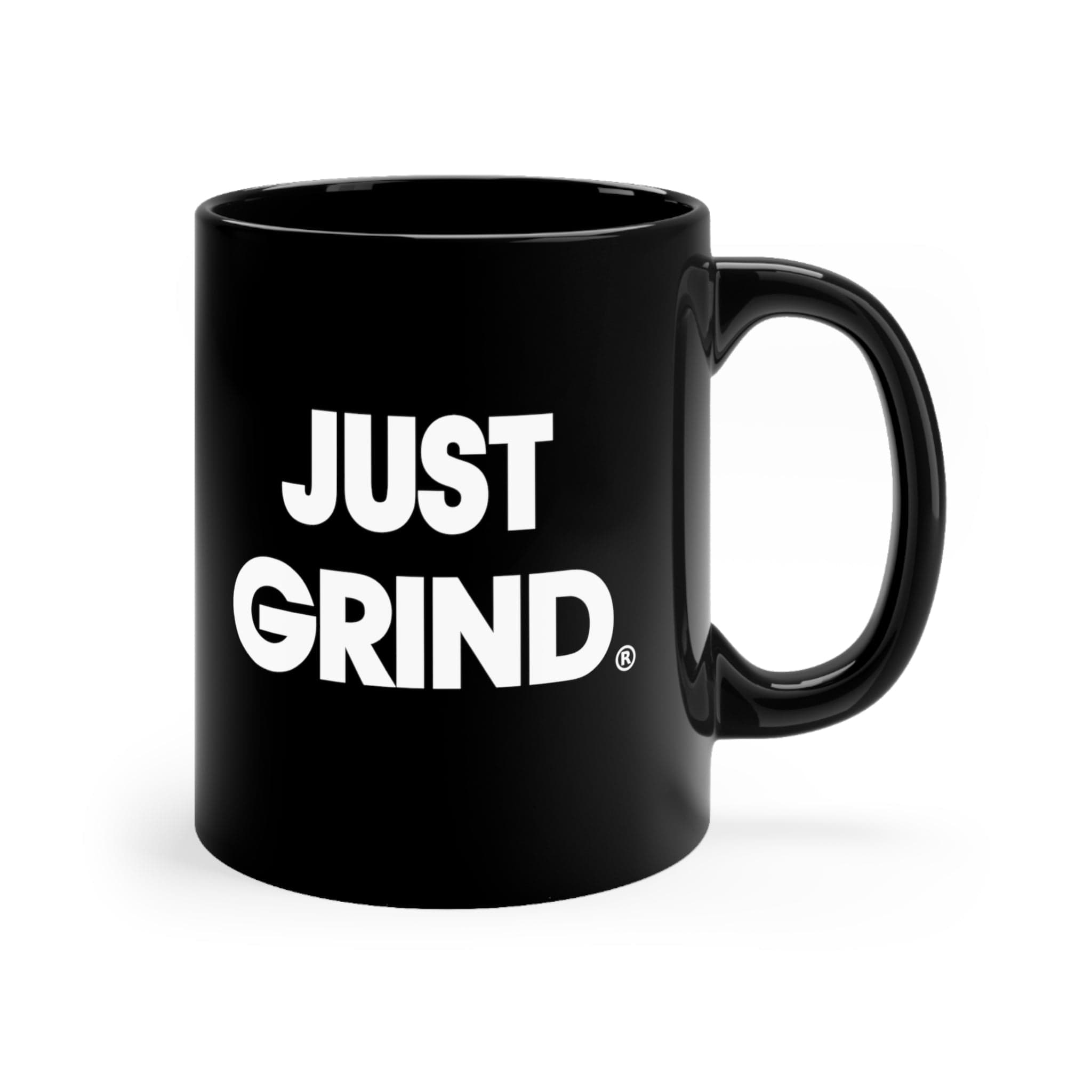 Black mug with the text 'JUST GRIND' in white letters.